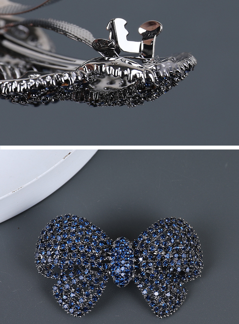 Gray rhinestone bow hair clip