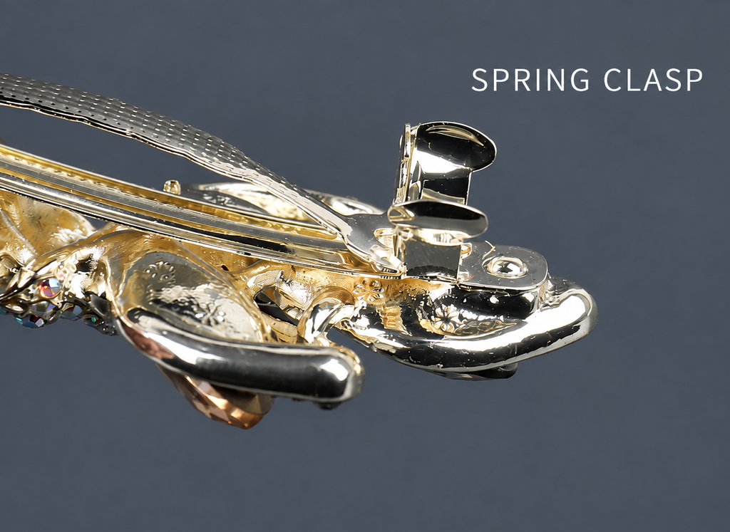 Close-up of the A268 metal spring clasp and gold-tone barrette frame. AI-assisted supplier photo edit.