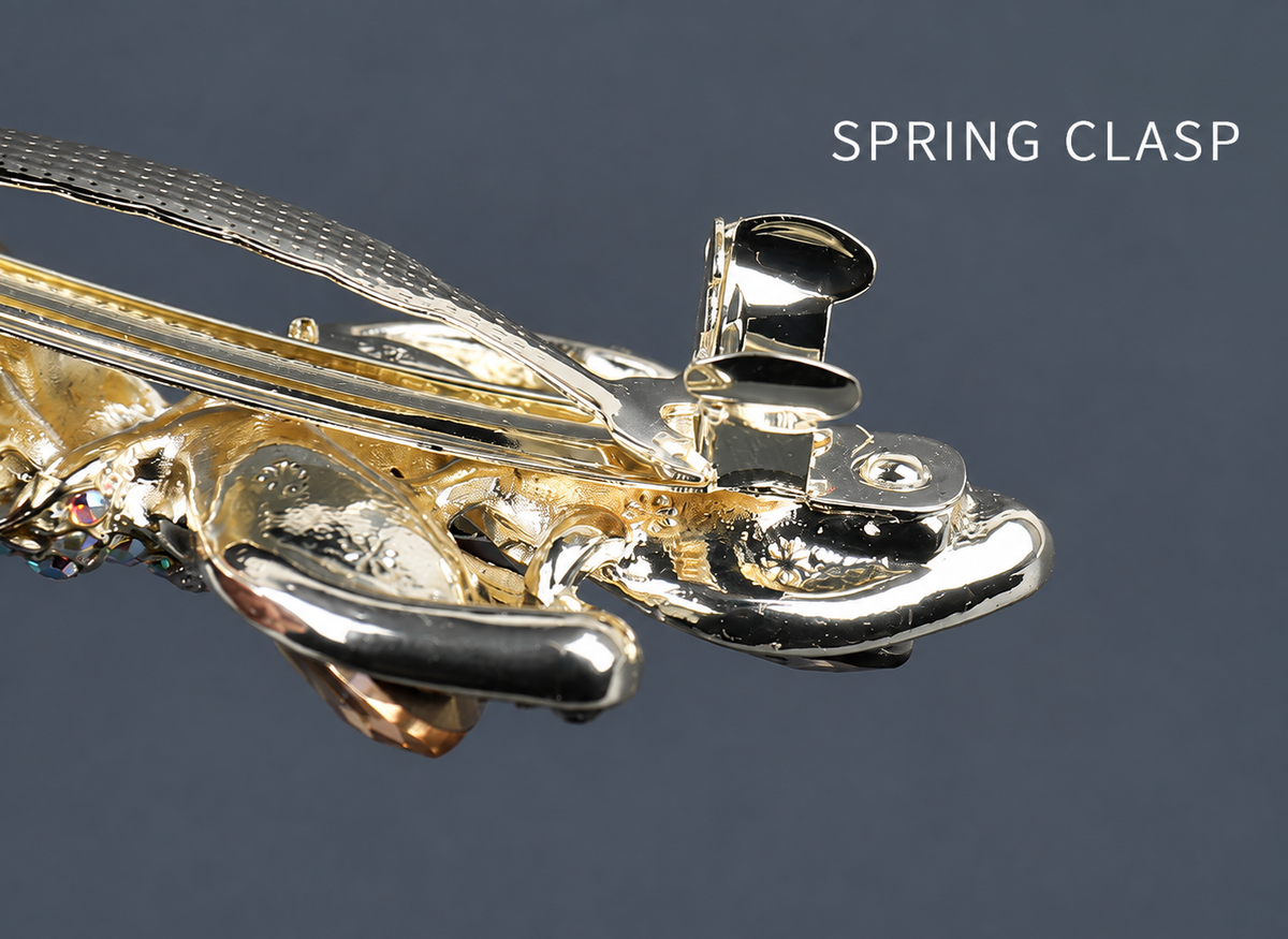 Close-up of the A268 metal spring clasp and gold-tone barrette frame. AI-assisted supplier photo edit.