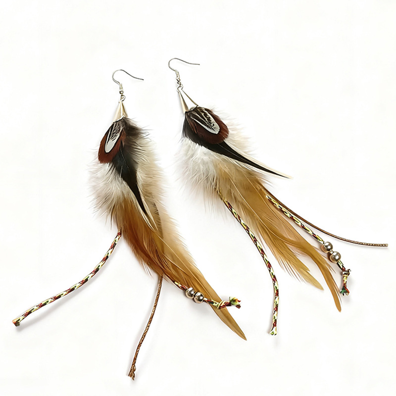 Layered brown and cream feather earrings with cord and bead details