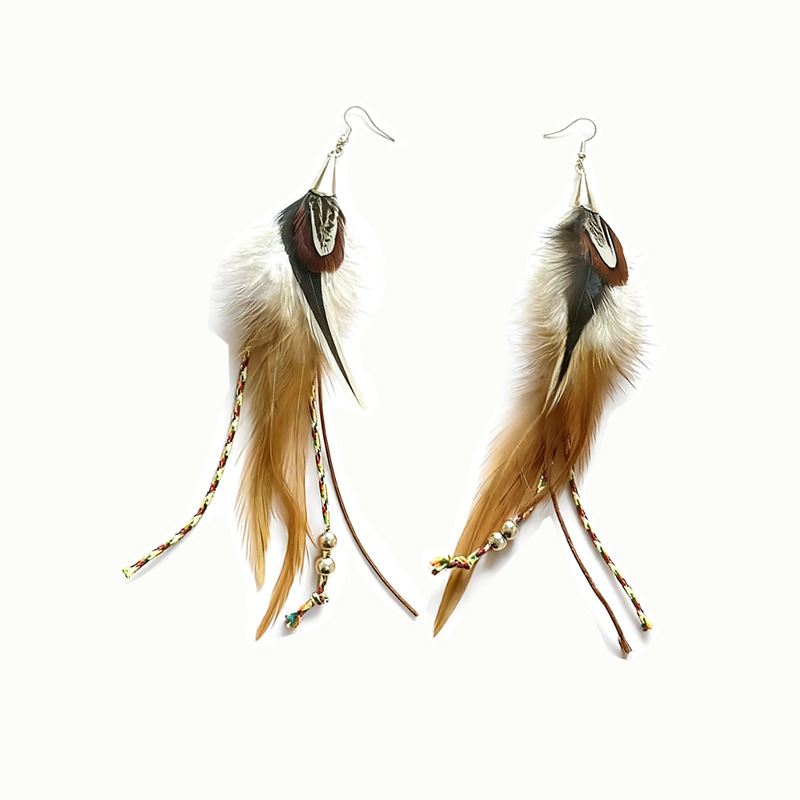 Pair of long brown and cream feather tassel earrings with decorative cords