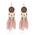 Pair of blush pink feather earrings with floral medallions