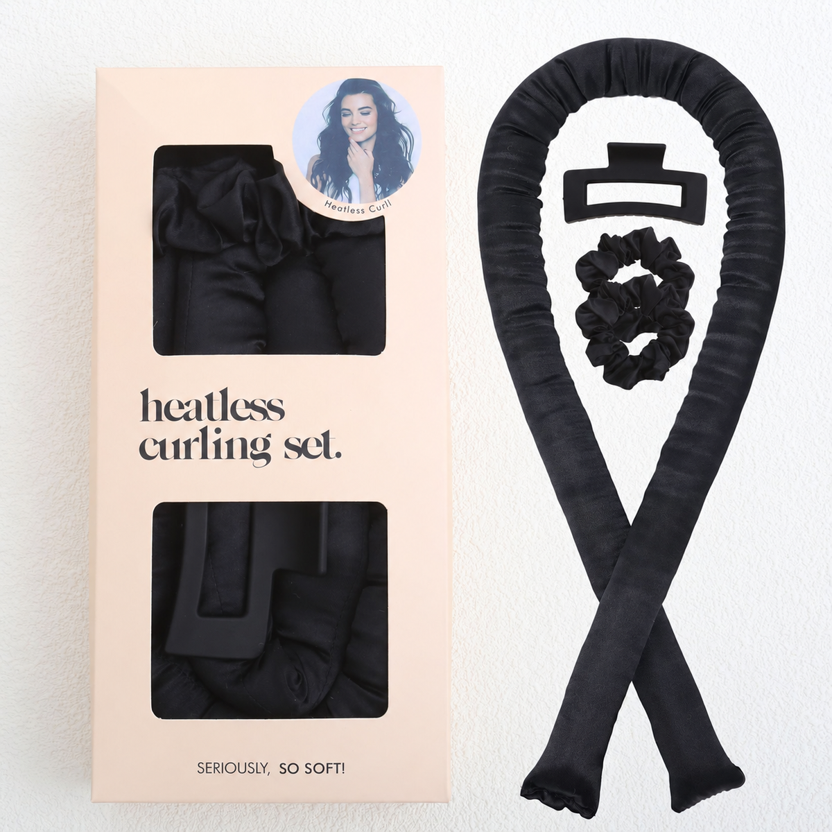 Black heatless curling set with one rod, two scrunchies, a claw clip and box