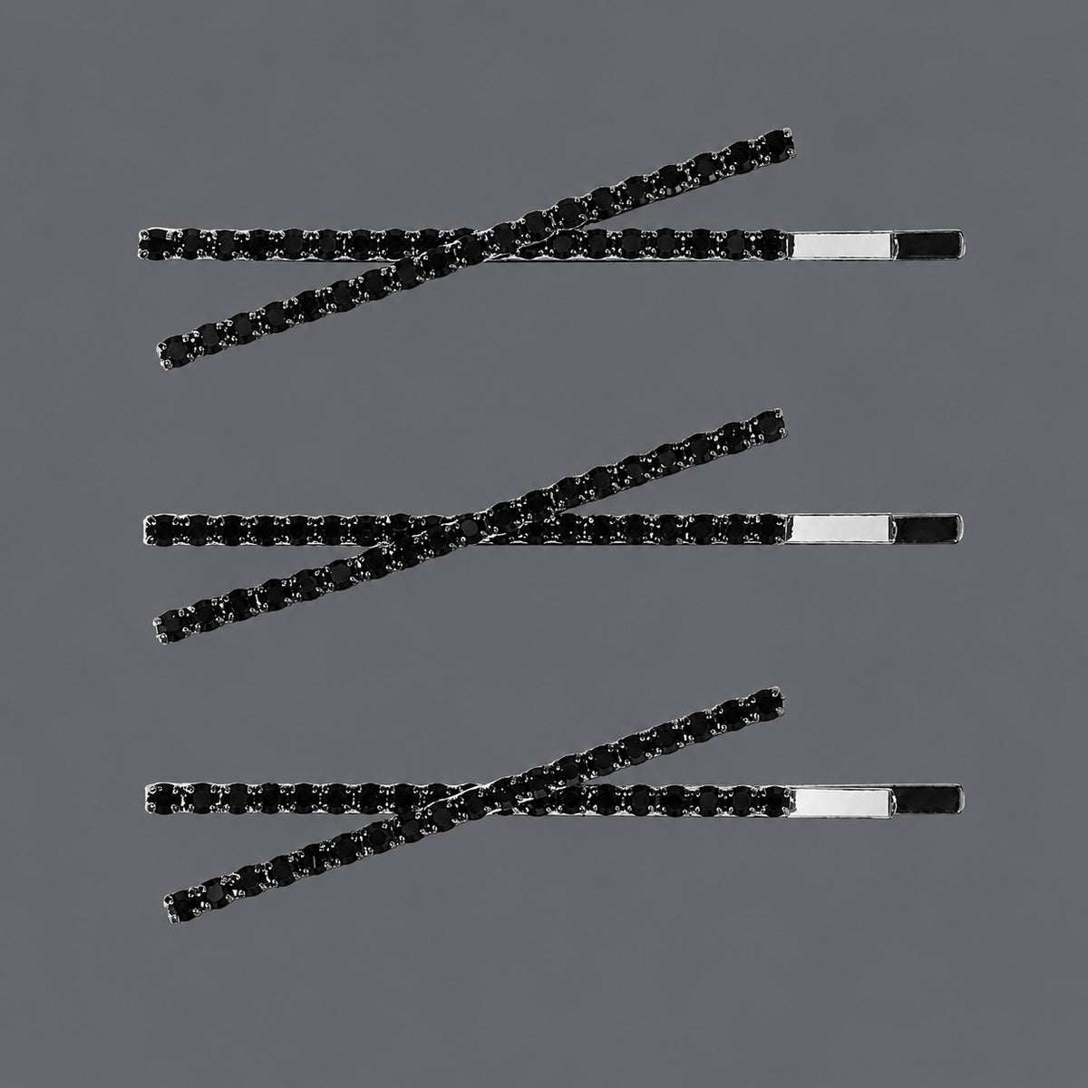 Black Rhinestone X Hair Pins - Set of 3 on a gray background