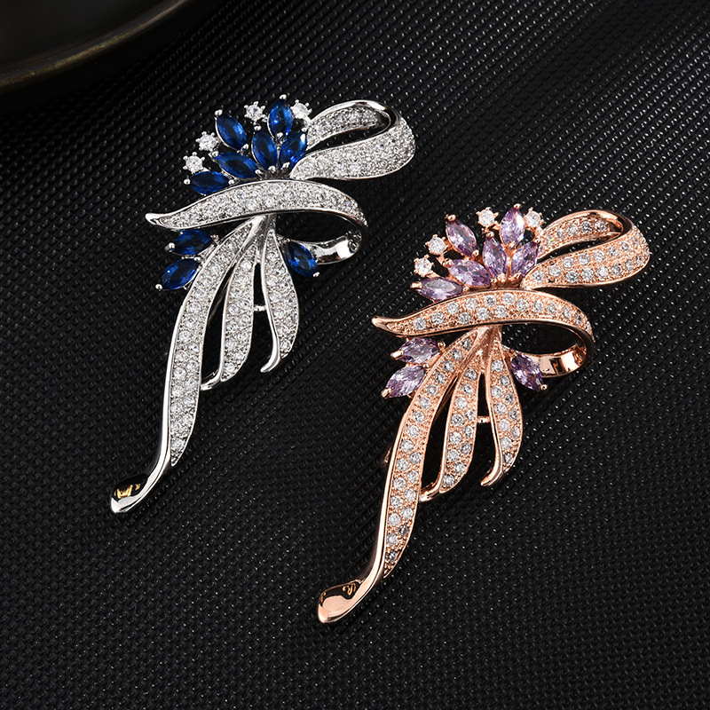 Rose Gold with purple stones and Silver with blue stones; brooches sold individually