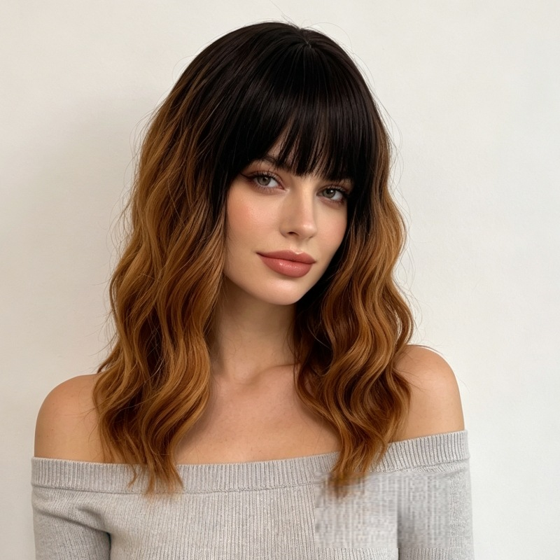 Supplier-provided front styling illustration of a black-rooted caramel brown wavy wig with bangs; not a verified wearer photograph