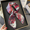Crimson Abstract printed square scarf, tied in a loose knot; design Z2-19327