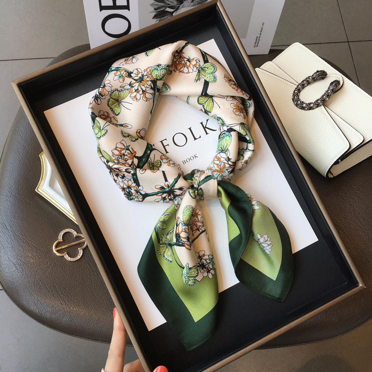 Green Butterfly Garden printed square scarf, tied in a loose knot; design Z2-19330