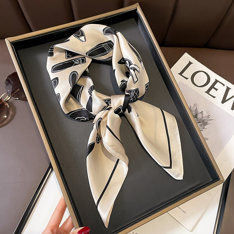 Ivory Beauty Icons printed square scarf, tied in a loose knot; design Z2-19333