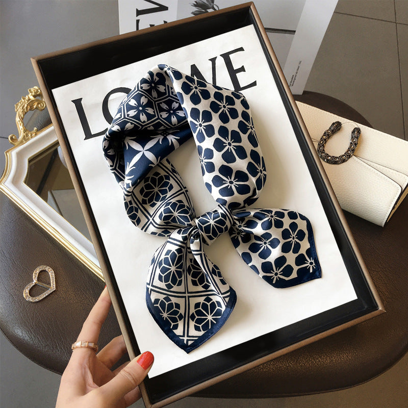 Navy Floral Tiles printed square scarf, tied in a loose knot; design Z2-19352