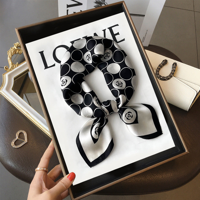 Black Circle Floral printed square scarf, tied in a loose knot; design Z2-19355
