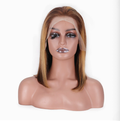 Front view of a brown and honey-blonde highlight human hair bob wig with uncut lace on a mannequin