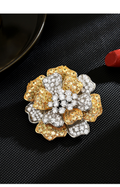 Gold-tone and silver-tone peony brooch with layered petals and clear and yellow decorative stones