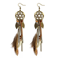 Pair of E33 brown feather earrings with open-center web medallions, leaf charms and chain tassels