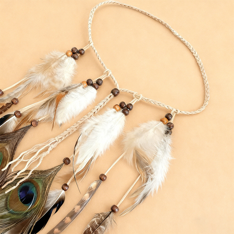 Close-up of the tan braid, brown beads, and cream feather trims