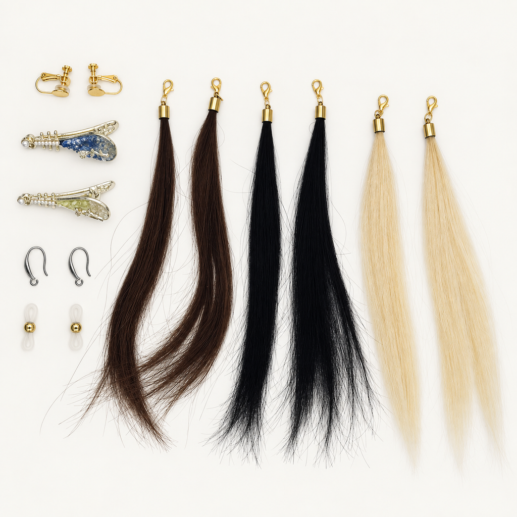 Actual set: six human hair strands in Brown, Black and Blonde, with pipa-style hair clips, clip-on bases, stainless steel pierced-ear hooks and eyeglass loops. Gold-tone clips and connectors shown.
