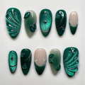 Emerald green cat-eye press-on nails with raised waves, star accents and nude French tips, style Y427