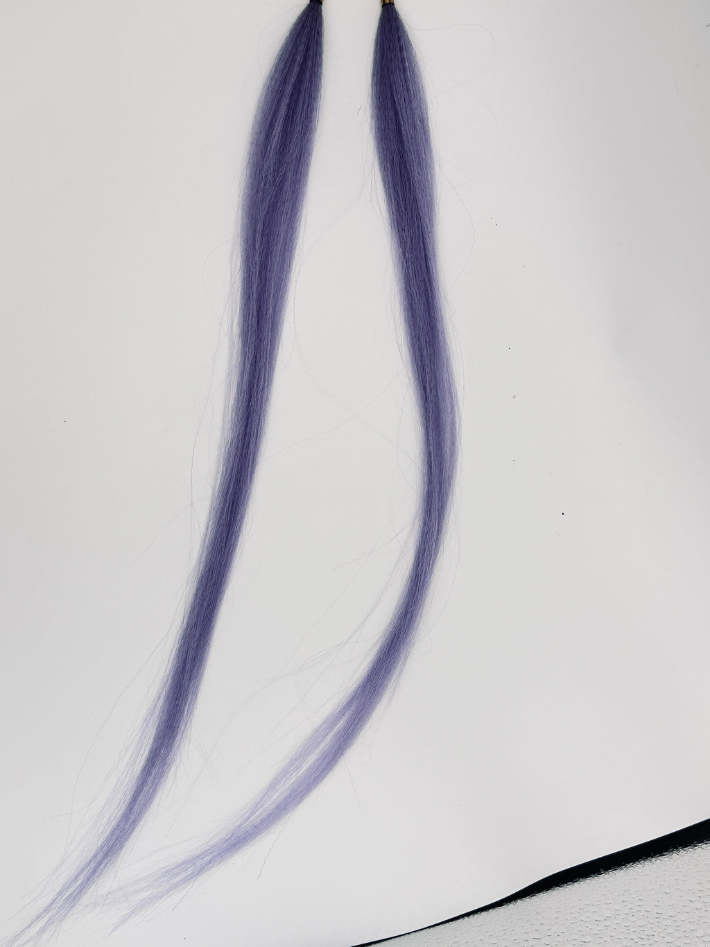 Purple straight synthetic hair charm pair; product photograph.