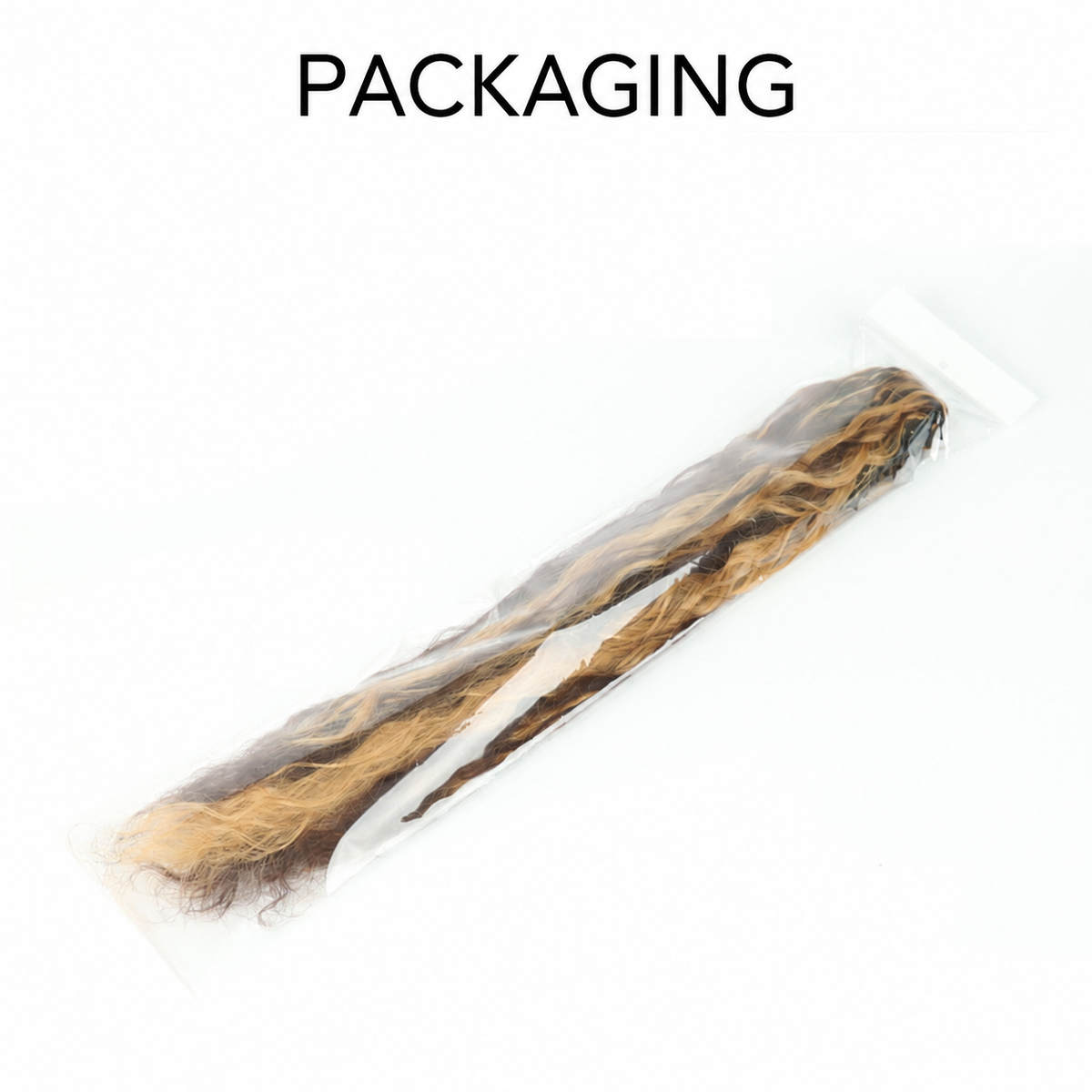 Ponytail extension in clear protective packaging