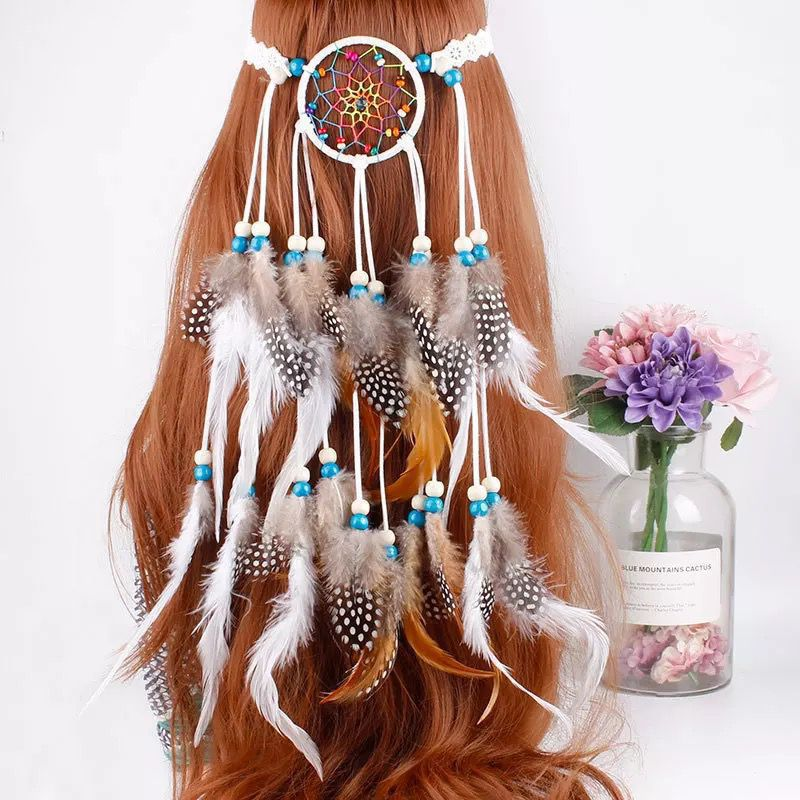 White woven-circle feather headband displayed on a mannequin with long beaded feather tassels
