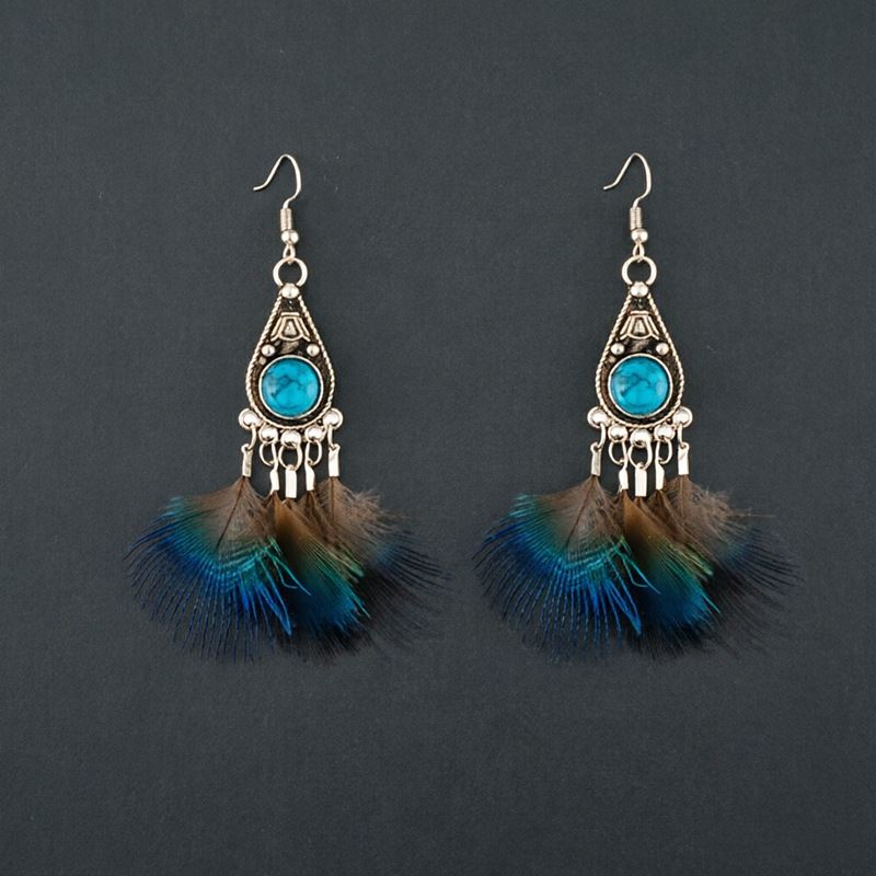 YX0530-4 earrings with blue-green feathers and silver-tone decorative settings