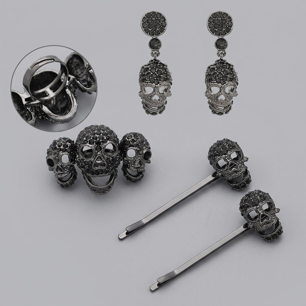 Gothic Rhinestone Skull Jewelry & Hair Pin Set on a gray background