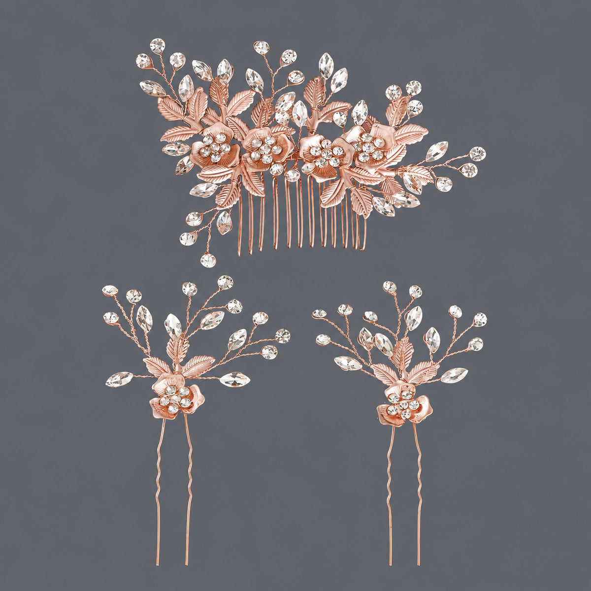 Rose gold-tone floral three-piece set with one rhinestone comb and two hair pins